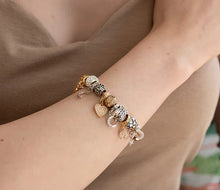Load image into Gallery viewer, Diamond Style London - Charm bracelet with central heart and moon charms (Item code: Charmbraheartgold)