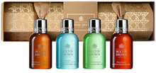 Load image into Gallery viewer, Molton Brown 4pc Gold Cracker - Woody and Aromatic Aromas